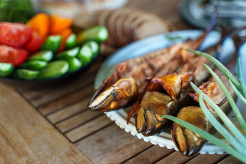 Hot smoked Scomber and fresh vegetables.