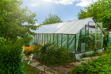 Traditional old greenhouse in the garden.