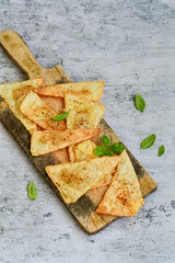  Home made ketogenic  Crispy nachos  tortilla chips with spicy red sauce. Mexican snack  for cinema.