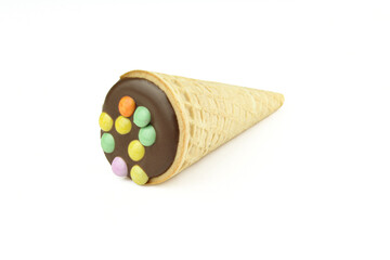 Mini cone icecream shaped chocolate candy isolated on white background