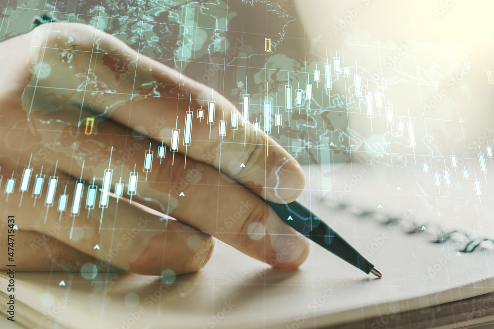Poster multi exposure of abstract financial diagram with world map and with man hand writing in notepad on 
