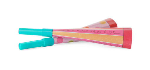 Bright party blowers on white background. Festive items