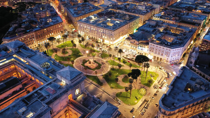 Aerial drone night shot from illuminated Cassation court Palace of justice, the highest supreme court of Italy next to famous piazza Cavour, Rome historic centre - obrazy, fototapety, plakaty