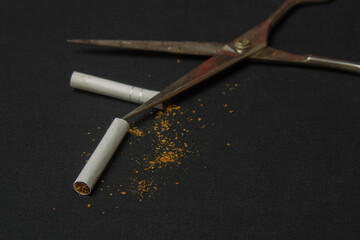Cutting a cigarette. Smoking cessation. Healthy Lifestyle