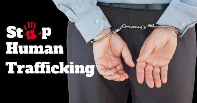 Animation of stop human trafficking text over caucasian man with handcuffs