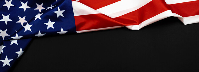 American flag for Memorial Day, 4th of July or Labour Day. USA flag on black background, banner, copy space, top view photo