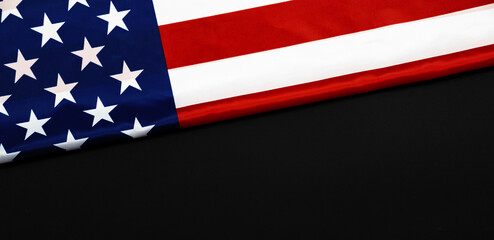 American flag for Memorial Day, 4th of July or Labour Day. USA flag on black background, copy space, top view photo