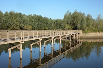 A wooden bridge in a side channel of the river IJssel at Deventer, the Netherlands
