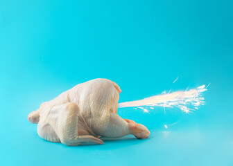 Raw Chicken farts fireworks on a blue background. Minimal party composition layout.