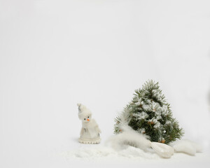 Christmas or New Year layout with white snowy Christmas tree and Christmas decoration. Bright Holiday background.