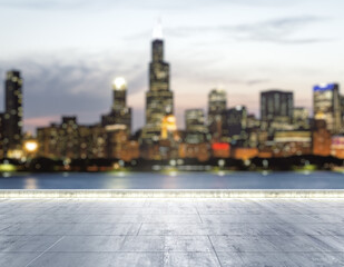 Empty concrete dirty seafront on the background of a beautiful blurry Chicago city skyline at night, mock up