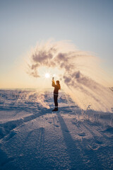 The frozen hot water in winter
