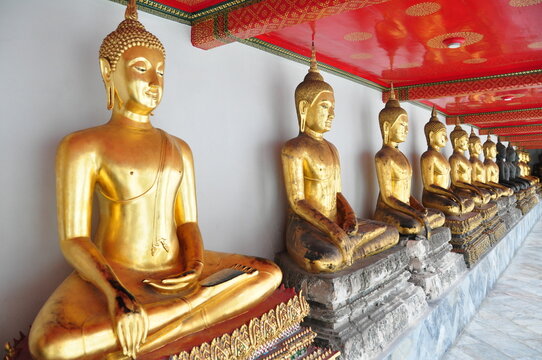 Golden statues of Buddha in Wat Arun temple, Bangkok Thailand