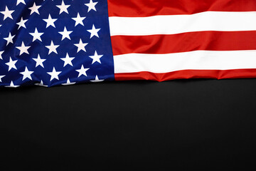 Fototapeta premium United States flag on black background. Memorial Day, 4th of July, Labour Day, Veteran's Day concept photo