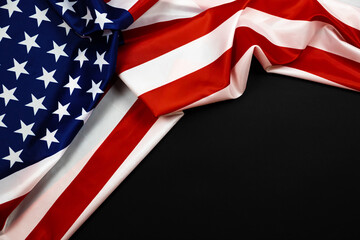 American flag for Memorial Day, 4th of July or Labour Day. USA flag on black background, copy space, top view photo