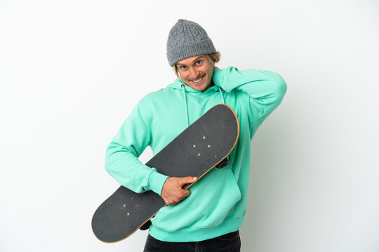 Young skater blonde man isolated on white background laughing