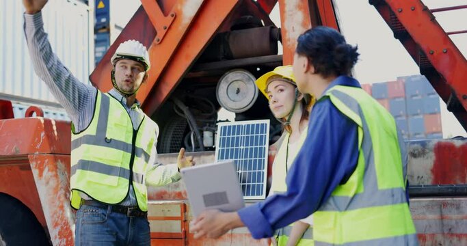 Electrical Engineer Technician is presenting solar panels for install in construction site or container for solar energy environmentally friendly. technology environment friendly alternative energy