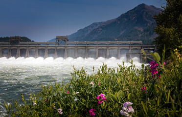 The power of water at the Cascade Locks dam in Oregon in summer - 474725652
