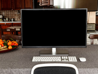 Computer monitor in n living room. Mockup for your website design on screen. Smart working