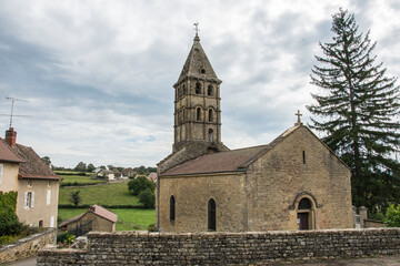 Fototapeta na wymiar Old, medieval, romanesque village church Saint Martin de Vareilles in the region of the Brionnais in France