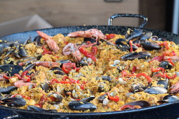 fish paella in a pan