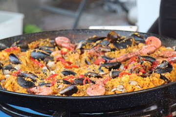 fish paella in a pan