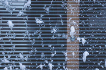 polycarbonate greenhouse in winter covered with snow as a background