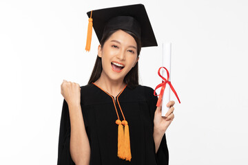Beautiful Attractive Asian woman graduated in cap and gown smile with certificated in her hand...