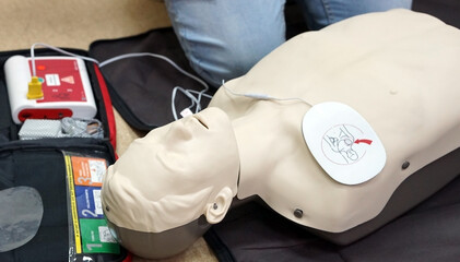 Basic life support simulation scenario for medical students on a dummy with an automatic external...