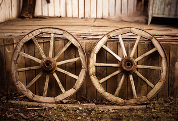 Photo of old wooden cart wheels