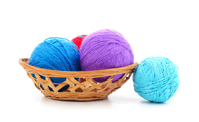 Knitted balls in a basket.