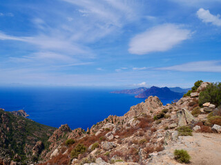 Red cliffs of the Calanche, UNESCO world heritage, and the Golf of Porto. Corsica, France.