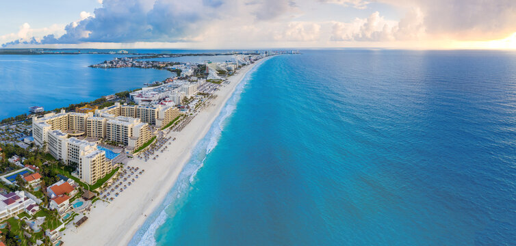 Cancun beach with orange sunset