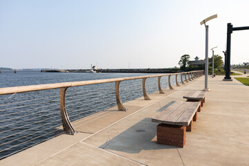 Empty Benches at Long Wharf Park along New Haven Harbor in New Haven Connecticut - obrazy, fototapety, plakaty