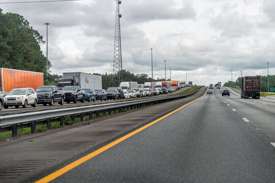 Yulee, USA - July 6, 2021: Interstate Highway I95 Driving Car Pov Near Jacksonville, Florida And Traffic Jam Of Many Trucks Vehicles Stuck Due To Accident On Road