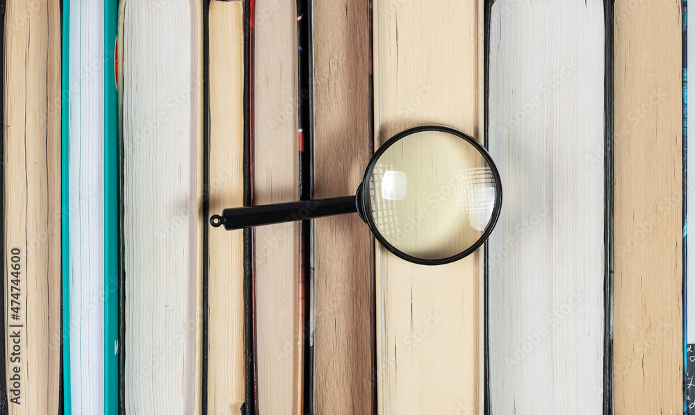Poster magnifying glass over stack of books with many pages. concept of search and investigation in library