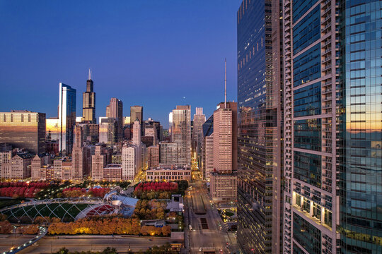 Millennium Park and aerial cityscape view at sunrise, Chicago, Illinois, USA