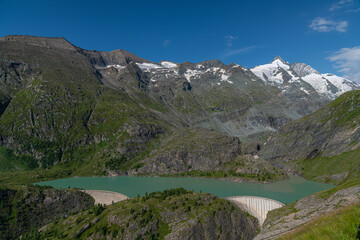 Fototapeta na wymiar Margaritze artifical lake with Grossglockner Summit in Hohe Tauern in Alps in Austria