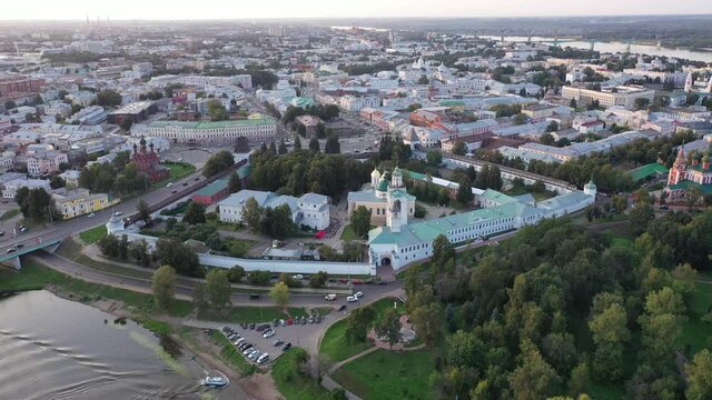 Picturesque summer view of russian town of Yaroslavl with many churches and Kotorosl river at sunset