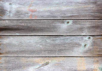 Old blue and grey wooden background with cracks and scratches in vintage style