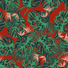 Naklejka na ściany i meble Seamless pattern with tropical leaves and wild flowers. Background for textile, fabric, wrapping paper, socks, clothes, web, stationery and other designs.