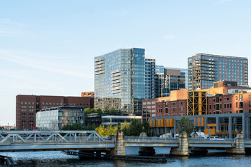 Panoramic picturesque city view of Boston Harbour at sunny day, Massachusetts. An intellectual, technological and political center. Building exteriors of financial downtown.