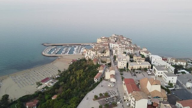 Aerial view on harbour of old Italian city Sperlonga and sea coast with sandy beaches, Italy