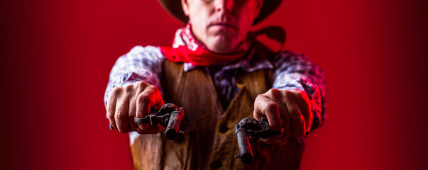 American bandit in mask, western man with hat. Portrait of farmer or cowboy in hat. Man wearing cowboy hat, gun. West, guns. Portrait of a cowboy. owboy with weapon on red background