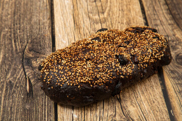 Grain bread on a wooden background.Proper nutrition at home.