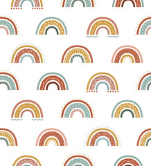 Seamless childish pattern with hand drawn rainbows. Cute pattern on arch in boho style. Scandinavian design for baby print. Vector illustration on white background.
