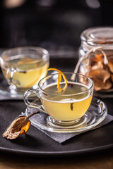 Whiskey drink Hot Teddy with dried pears. Mulled wine flavored with cloves and orange peel.