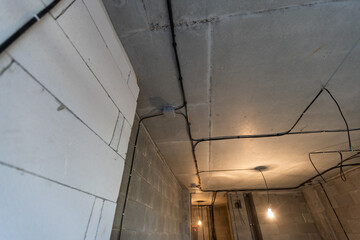 Working process of installing metal frames for plasterboard -drywall - for making gypsum walls in apartment is under construction, remodeling, renovation, extension, restoration and reconstruction