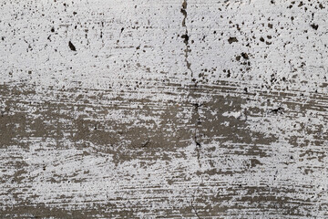 Fototapeta premium Cracked and abstract grunge texture. Aged material surface backdrop. Weathered effect pattern. Old and dirty background.