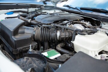 A changing car battery, Car battery repairman